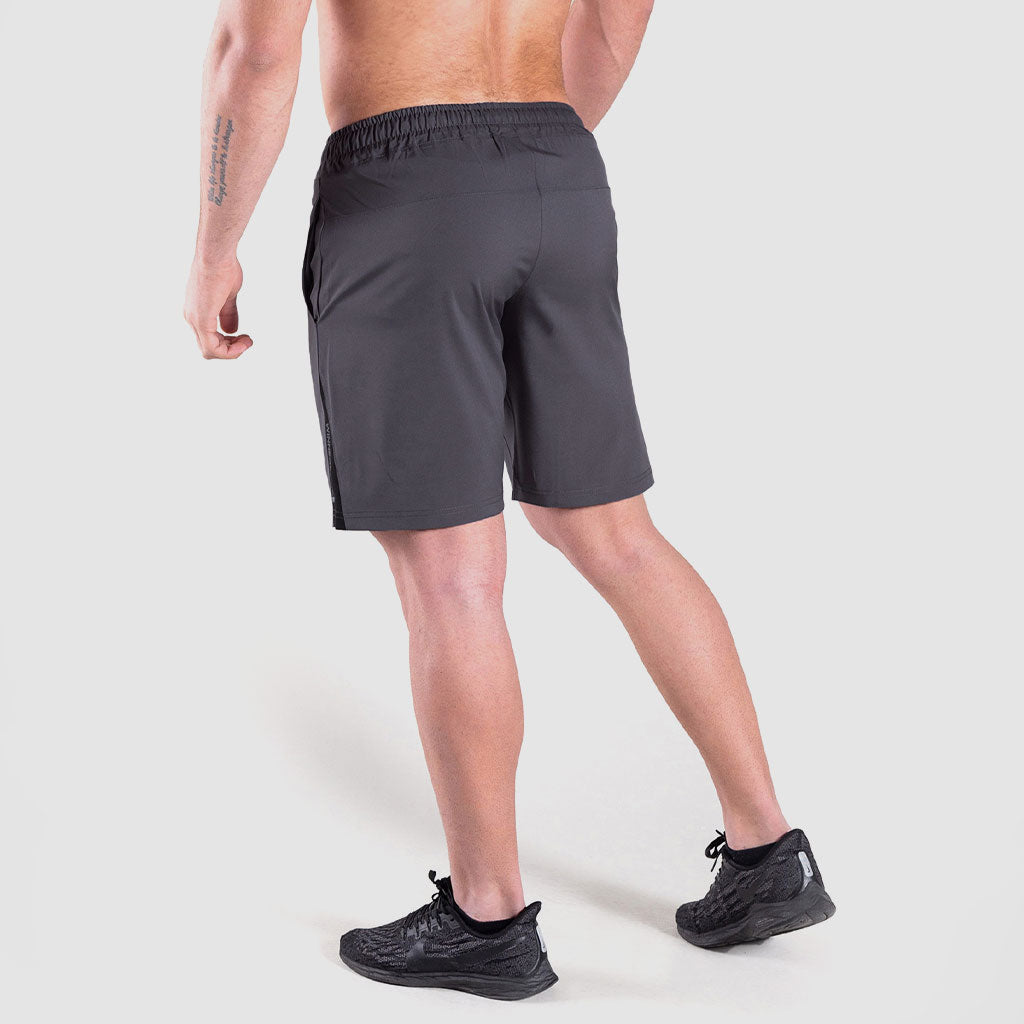 a back view for fit  man wearing short dark grey with shoes black