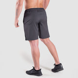 a back view for fit  man wearing short dark grey with shoes black