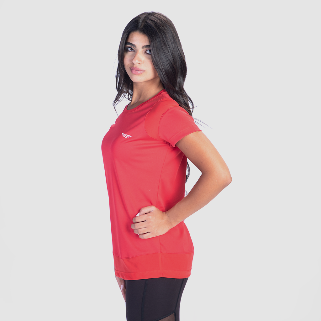 a fit woman stand at right and wearing t-shirt red with logo and legging black