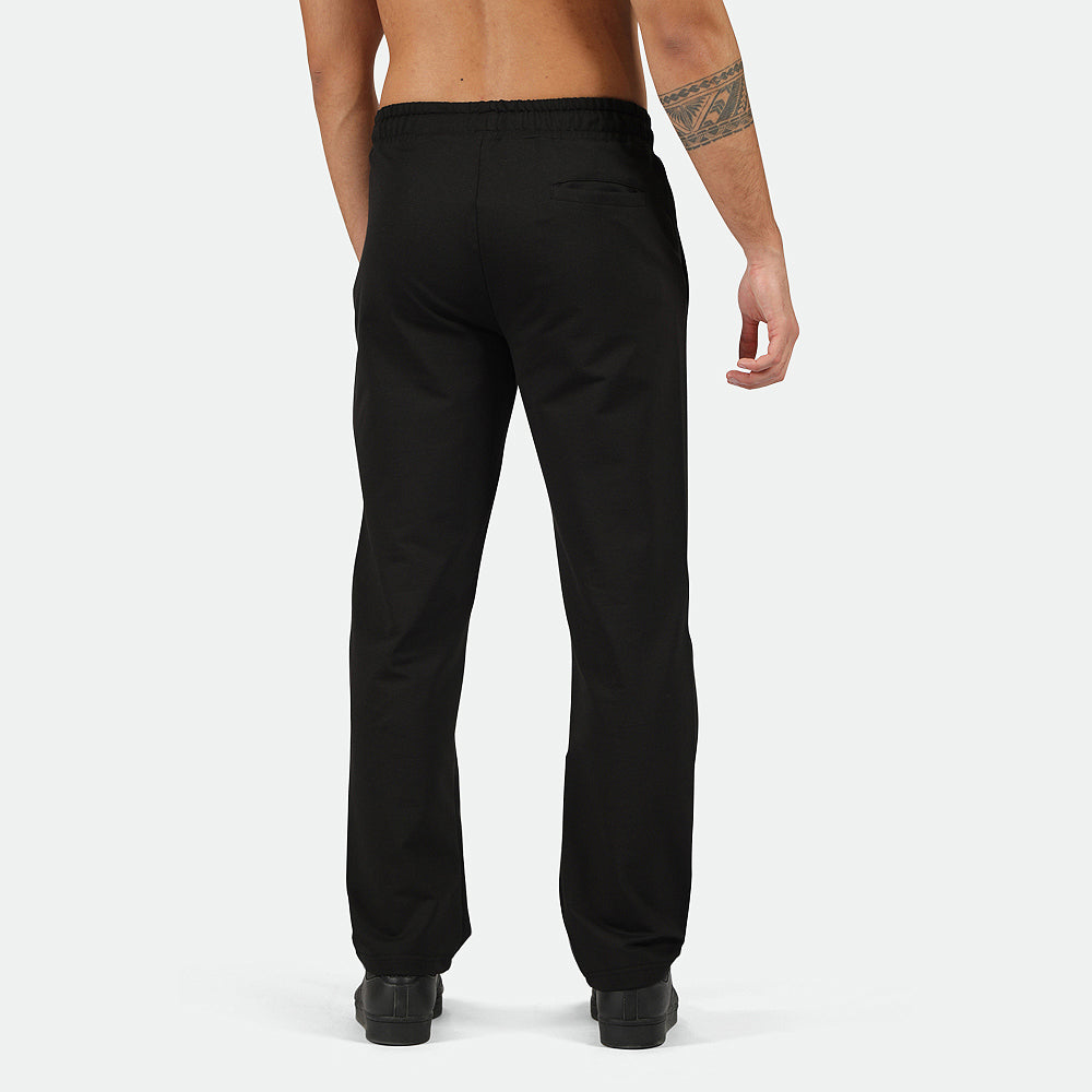 a back view  for fit man  wearing pants  black with shoes black 