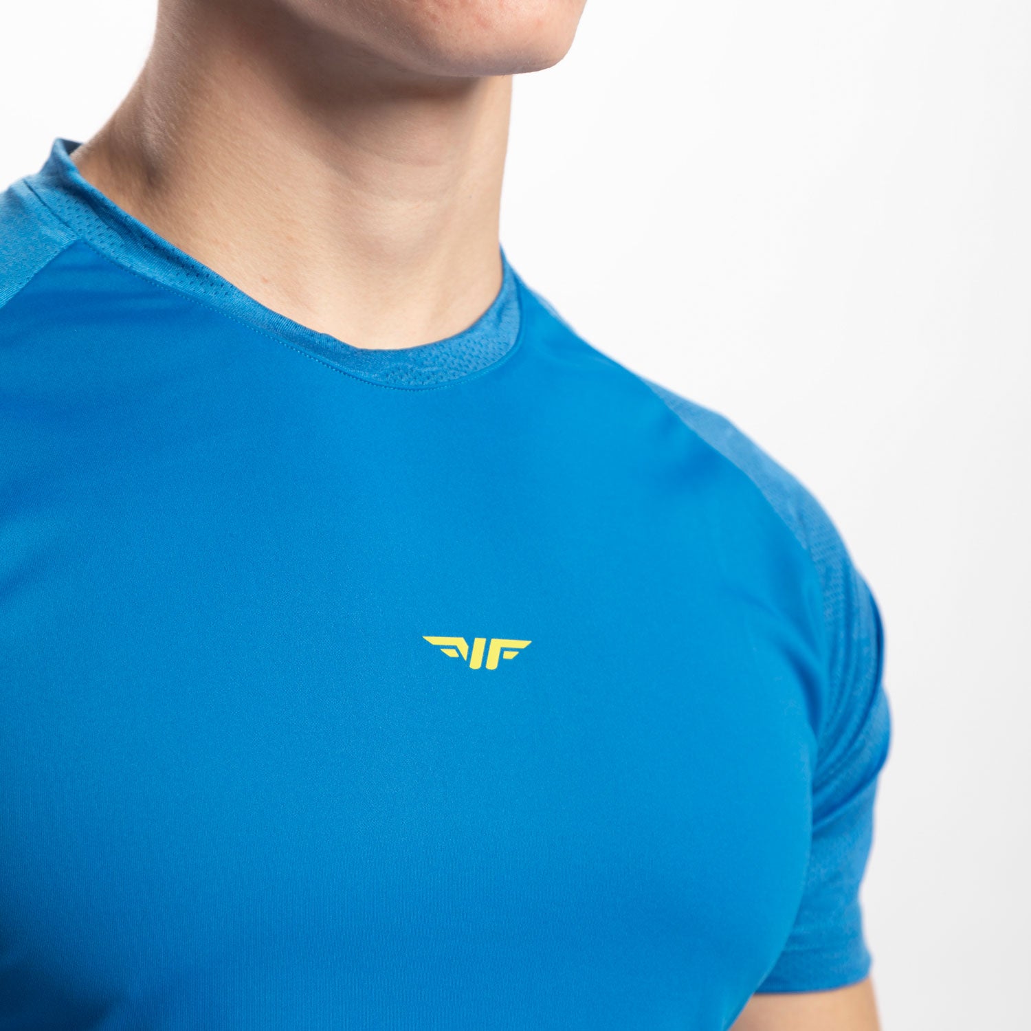 close up view for fit man wearing t-shirt azure blue with logo 