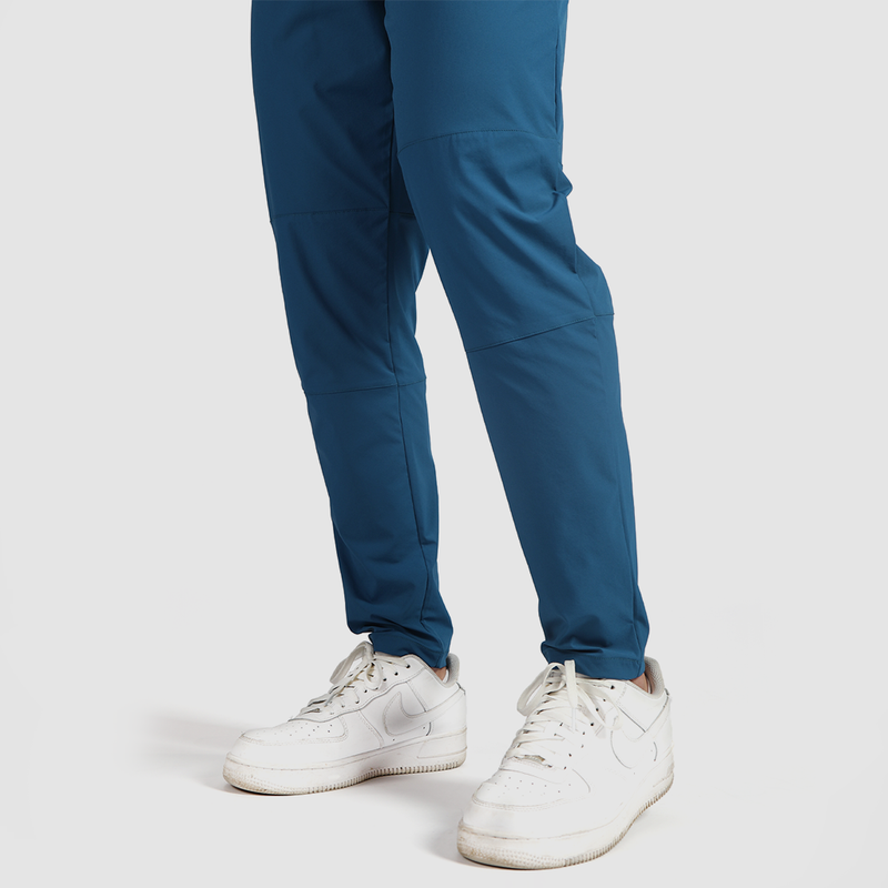 close down view for pants wearing pants classic blue  with shoes white 