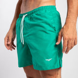 close up view for fit man wearing short green lake 