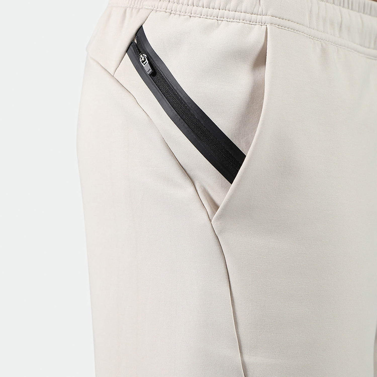 close up view for pocket zipped of short light beige 