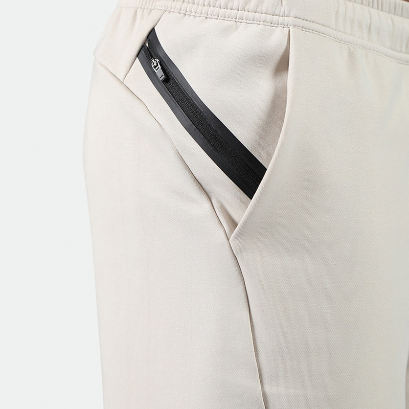 close up view for pocket zipped of short light beige 
