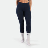 a fit woman wearing legging navy blue terrazzo with socks white 
