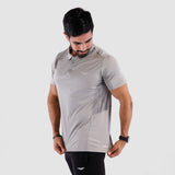 a fit man wearing t-shirt light grey with pants black 