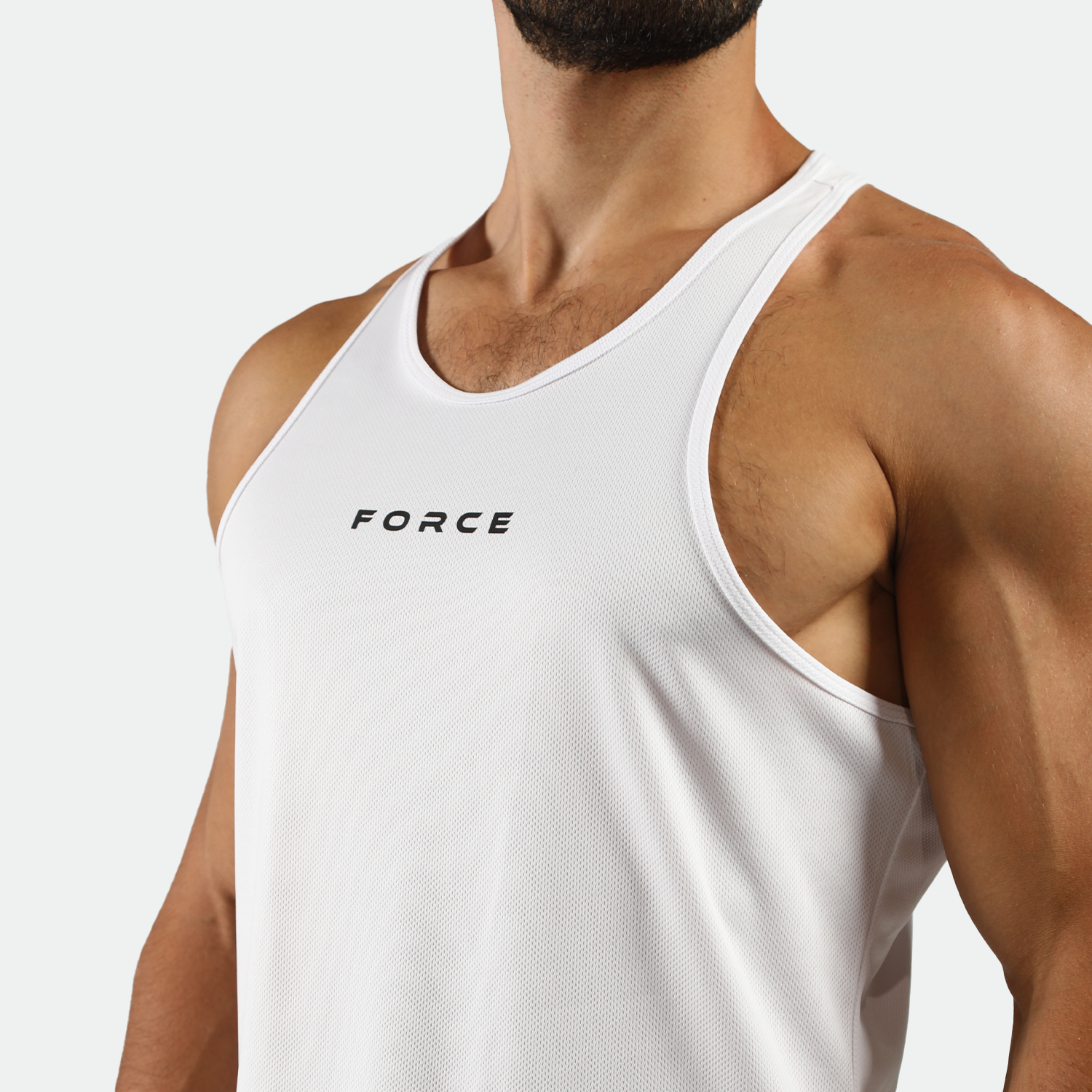 close up view for fit man wearing white with logo 