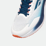 Close-up of a white athletic shoes with blue and orange details. The shoes features a blue lace, breathable mesh, and an orange rubber sole, conveying a sporty vibe.