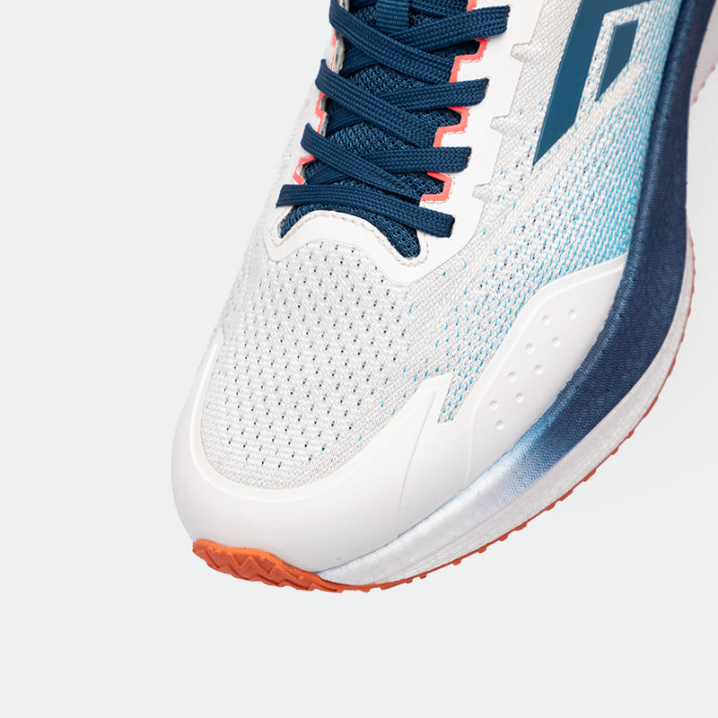 Close-up of a white athletic shoes with blue and orange details. The shoes features a blue lace, breathable mesh, and an orange rubber sole, conveying a sporty vibe.