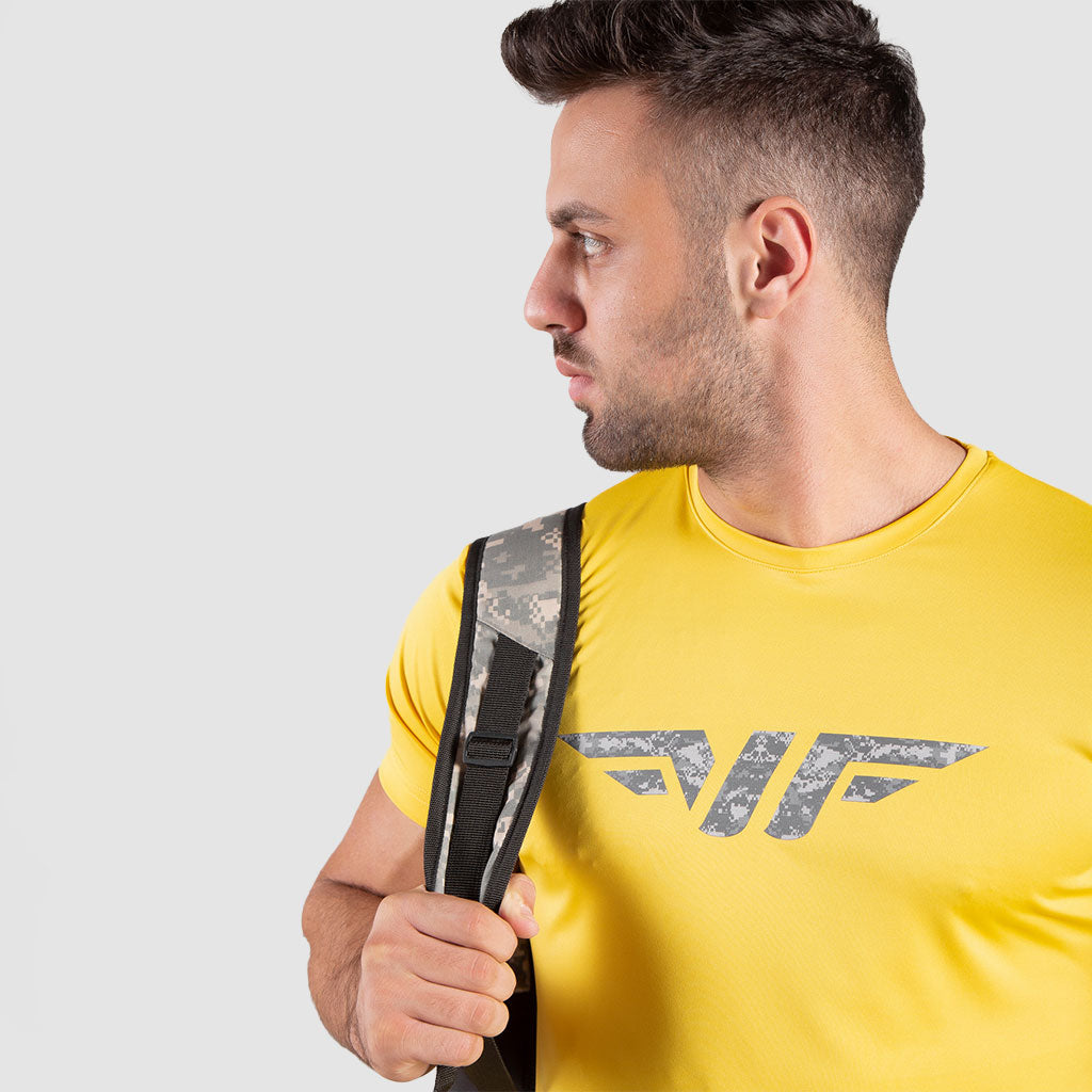 close up view for fit man wearing t-shirt yellow with logo 