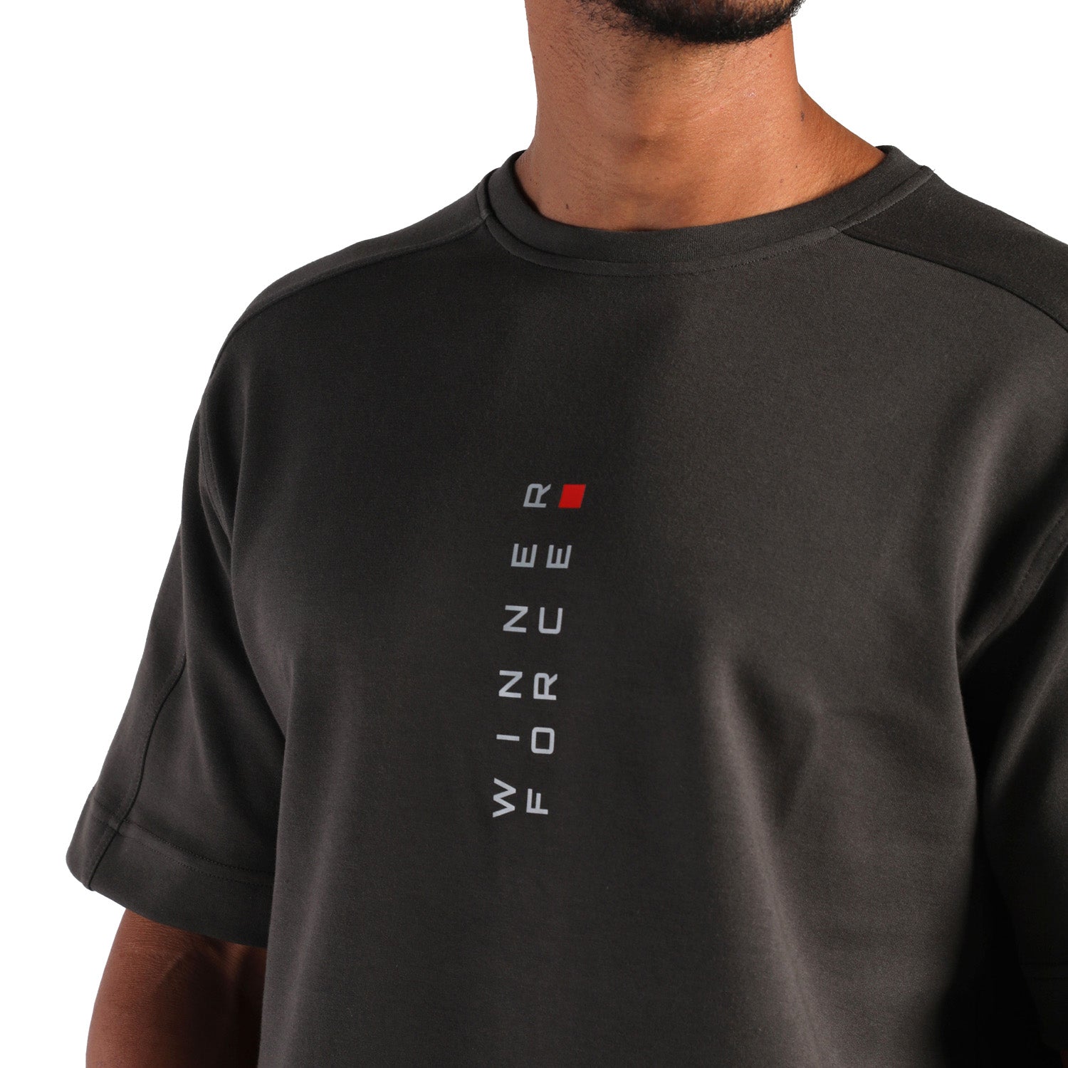 close up view for fit man wearing t-shirt  iron dark grey with logo 