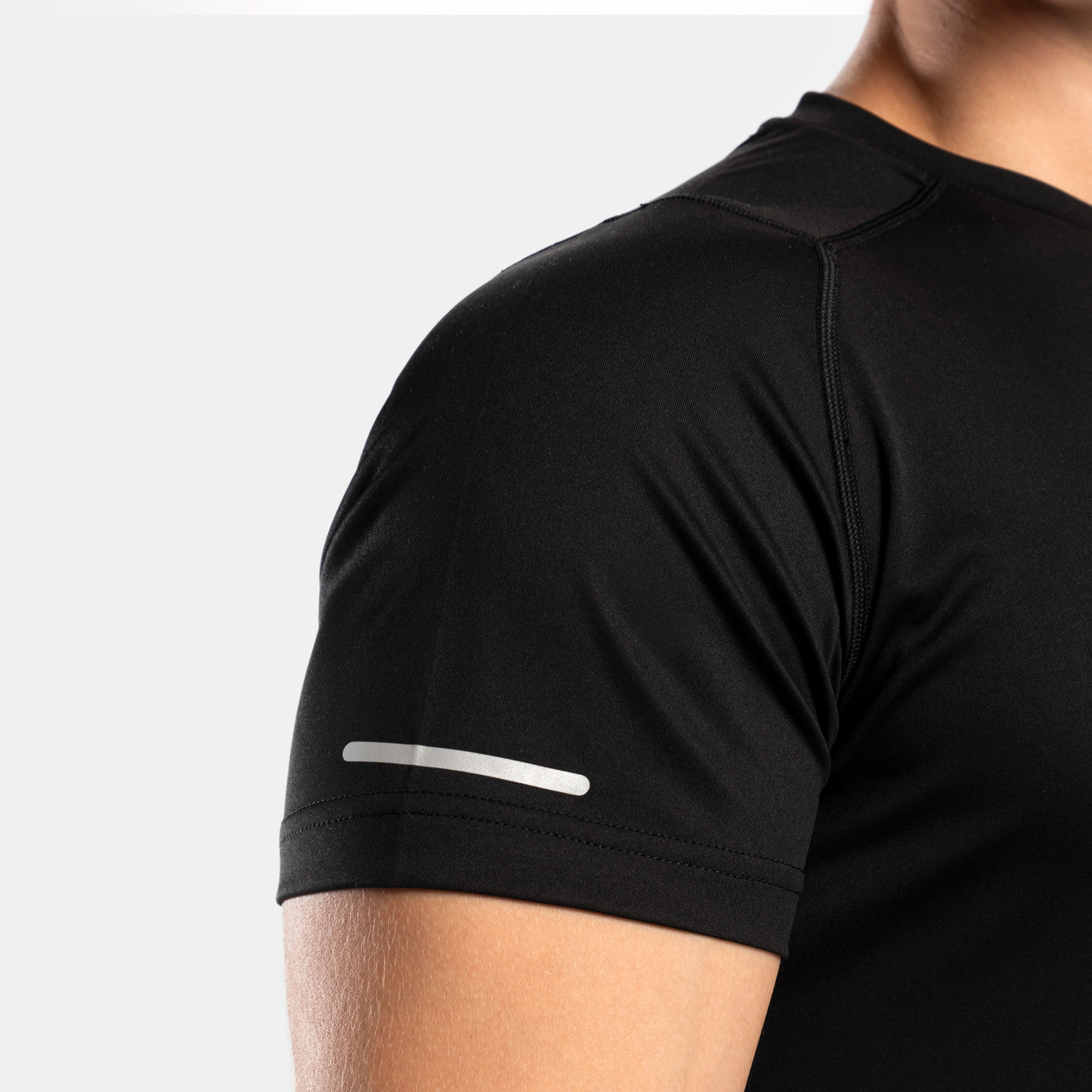 A close-up of the detail on the sleeve of a black t-shirt.