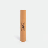 Brown foam roller with "winnerforce " and a logo printed in black. Stands vertically on a light grey background, it is conveying simplicity and utility.