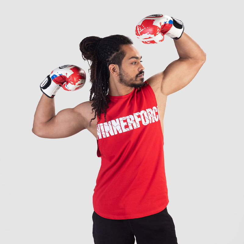 a fit man wearing high risk red with logo and pants black 