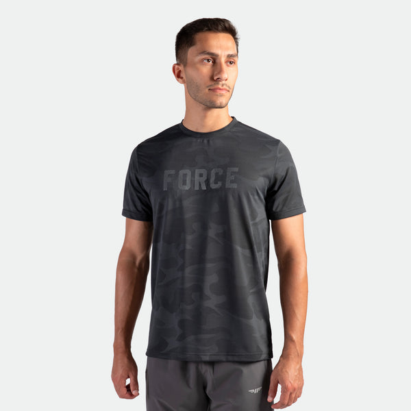 a fit man wearing t-shirt  blue graphite camo with logo ,plus the pants grey 