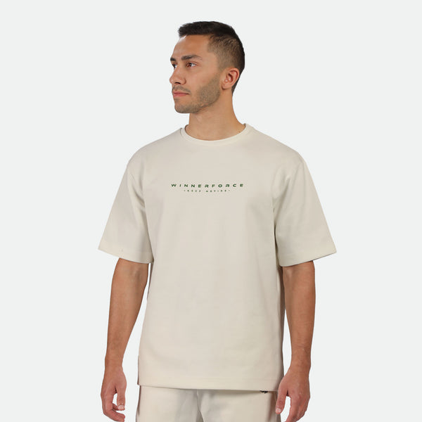 a fit man wearing matching set light beige ,t-shirt and shot 