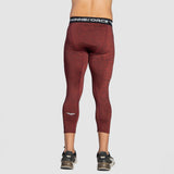 a back view for fit man wearing base layer  red with shoes 