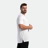 a fit man stand at right and wearing t-shirt white with pants black 