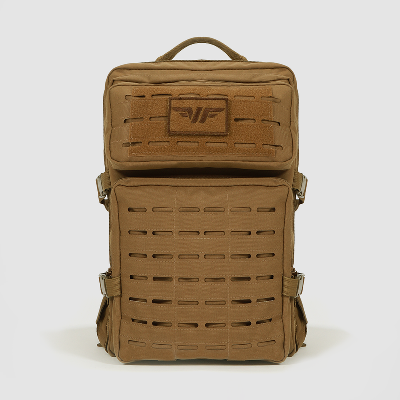 A tan tactical backpack with a rectangular shape, two main compartments, laser-cut MOLLE panels, side buckles, and a sturdy top handle, displayed against a plain white background.