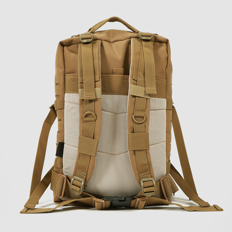 Tan and beige backpack shown from the back, featuring padded shoulder straps, adjustable waist and chest belts, mesh back panel, and multiple attachment loops, photographed against a plain light background