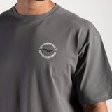 close up view for fit man wearing t-shit dark grey with logo 