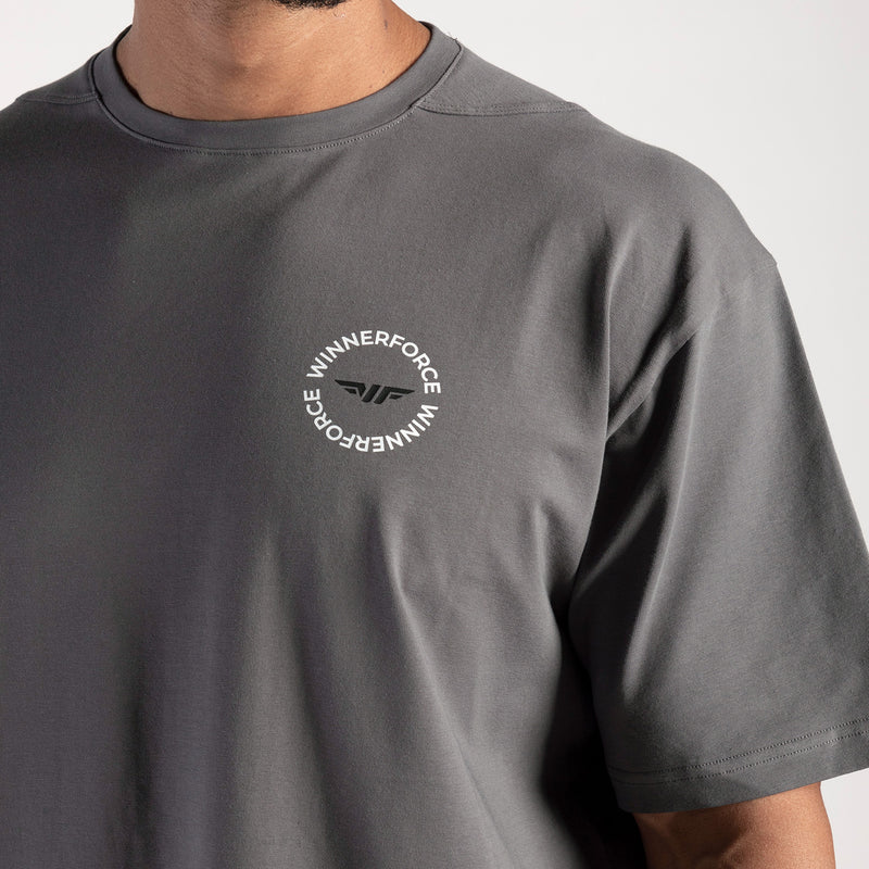 close up view for fit man wearing t-shit dark grey with logo 