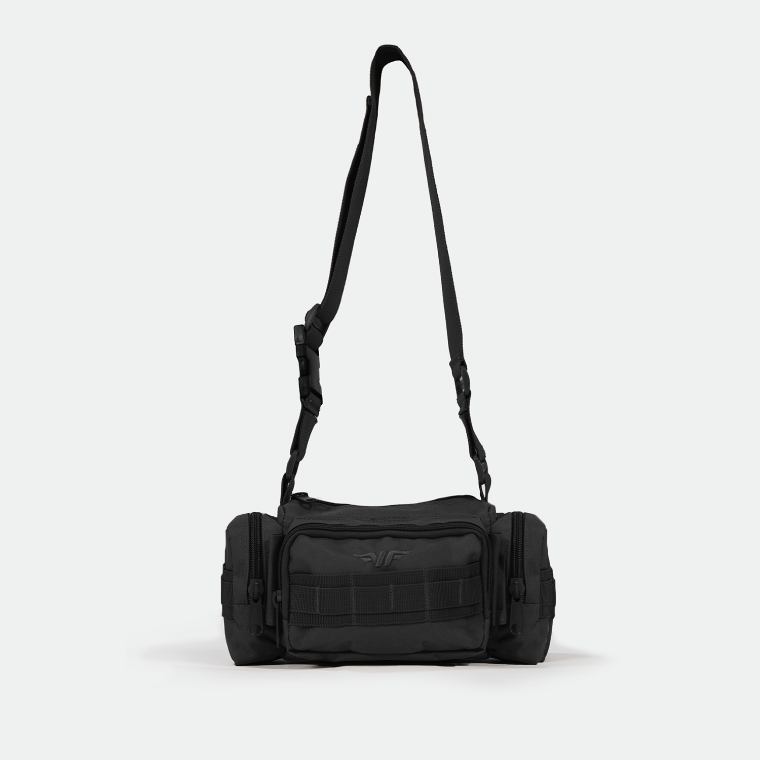 A black duffel bag with multiple zippered compartments and an adjustable shoulder strap