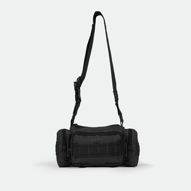 A black duffel bag with multiple zippered compartments and an adjustable shoulder strap