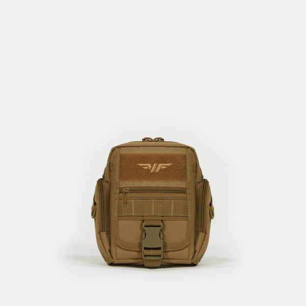 A small, tan tactical pouch with multiple zippered compartments, side pockets, a front buckle, and a winged logo on the upper front. The pouch is displayed upright against a plain white background.