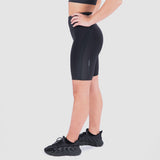 a back view for fit woman wearing seamless short black with little mesh fabric and logo ,she wearing shoes black, plus the background is light grey  