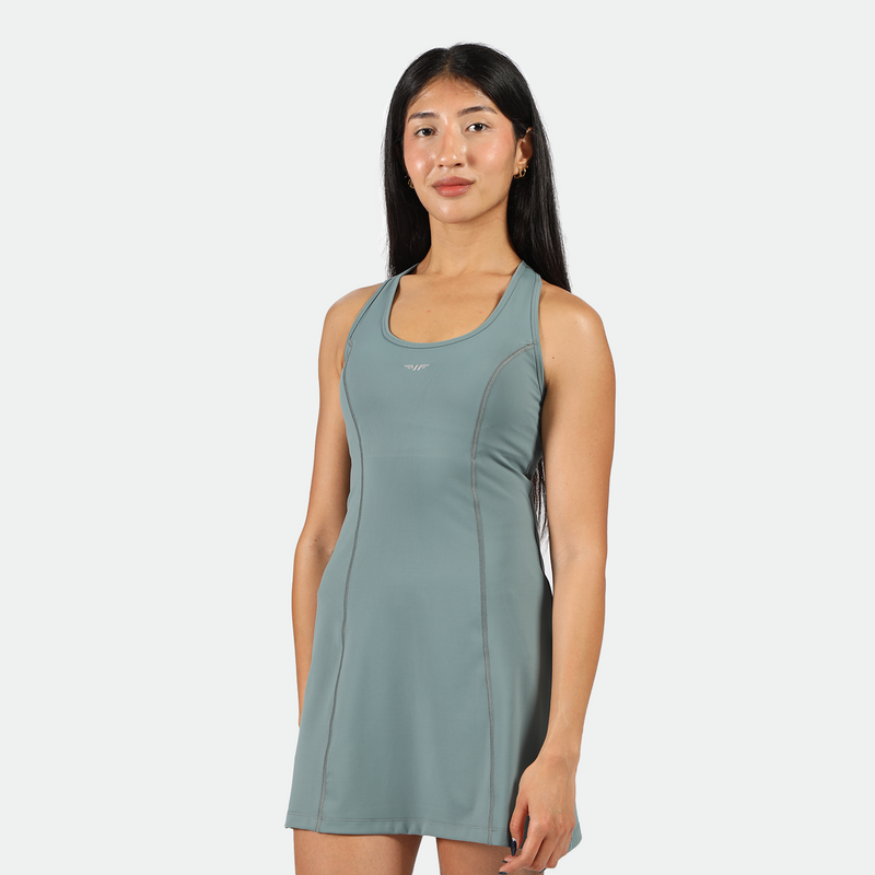  a fit woman wearing dress green with logo 