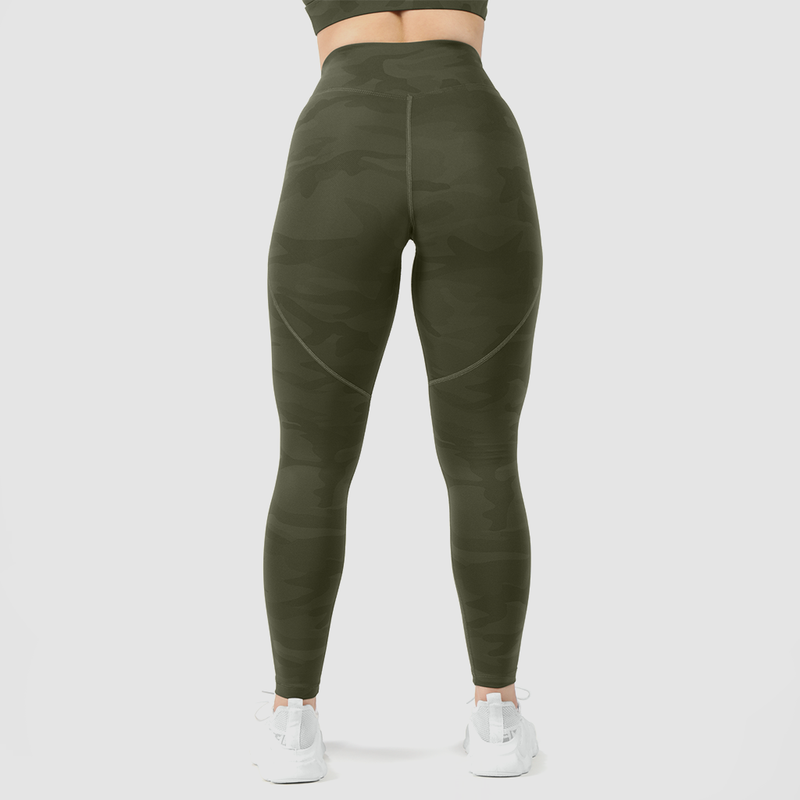 a back view for woman wearing  olive camouflage legging with shoes white ,the background is light grey 