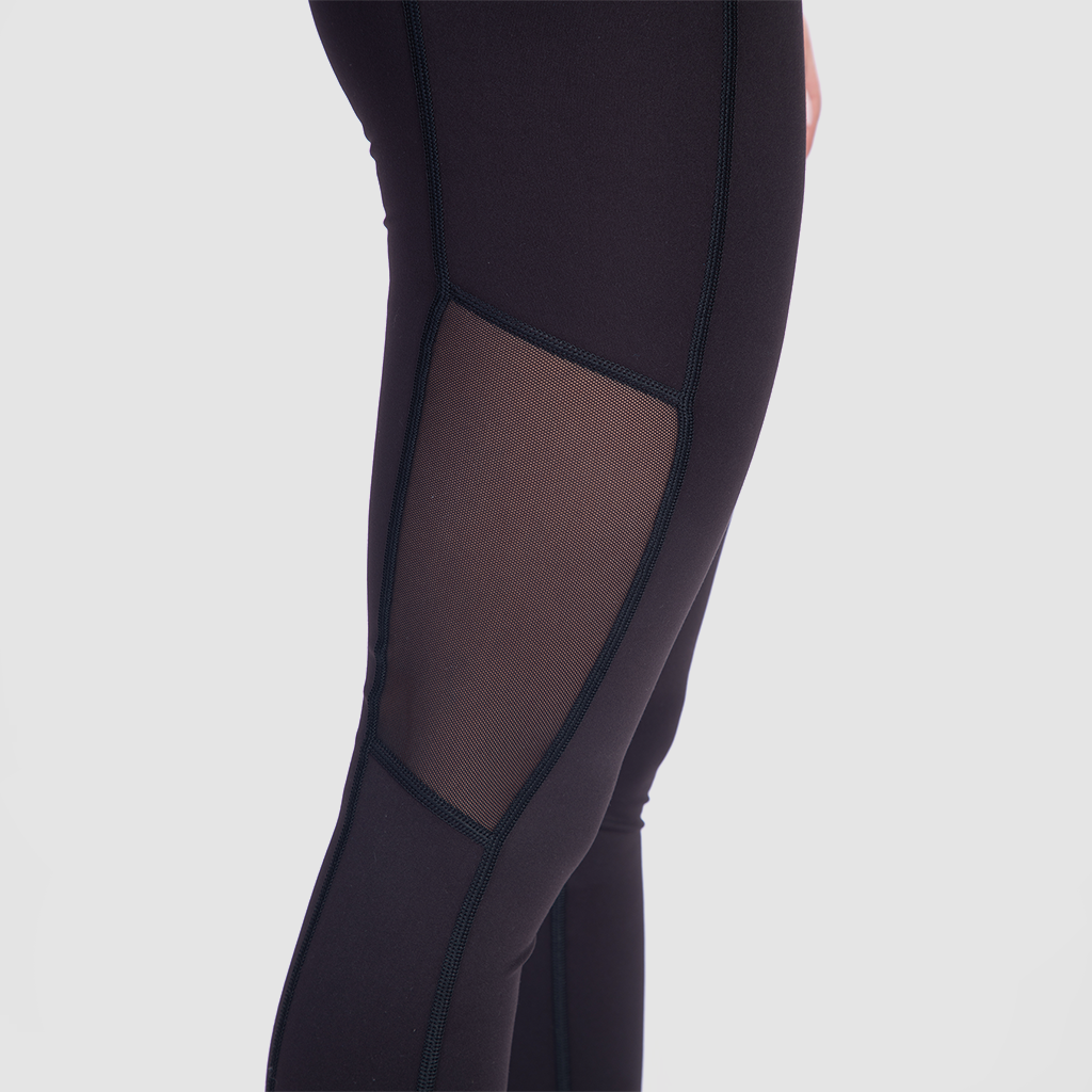 close up view for fit woman wearing  legging black with little mesh fabric 