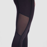 close up view for fit woman wearing  legging black with little mesh fabric 