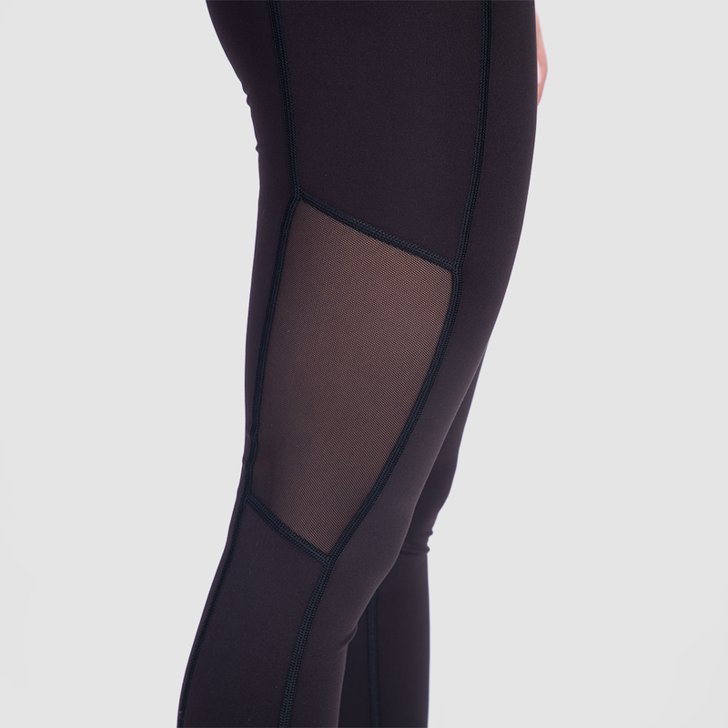close up view for fit woman wearing  legging black with little mesh fabric 