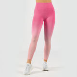 a fit  woman  wearing legging pink   with logo white  and sneakers ,plus background light grey 