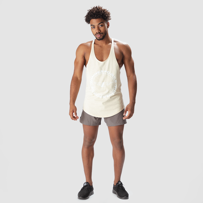 a fit man wearing tank afterglow with logo and short grey ,plus shoes black 