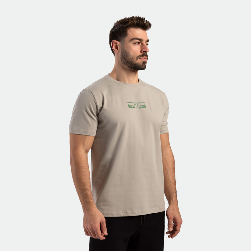 close up view  for fit  man wearing t-shirt  agate grey with logo and pants black 