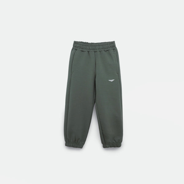 AGAVE-GREEN JOGGER PANT FOR GIRL with an elastic waistband and cuffs, featuring a small white logo (WINNER FORCE) on the left thigh, displayed against a plain light background.