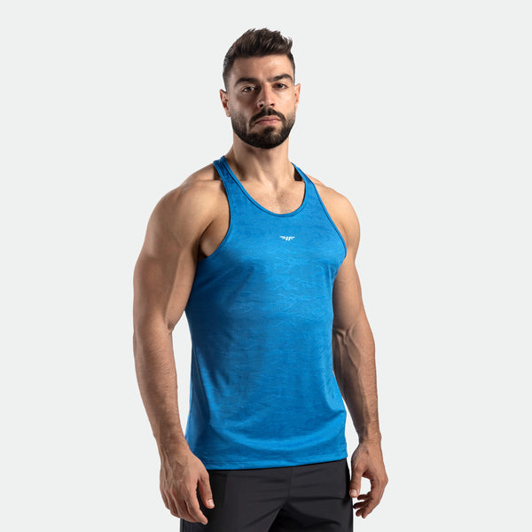 a fit man wearing tank camo azure blue with logo n half and pants black 