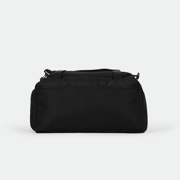Black sports bag with "WINNERFORCE" in bold lettering on the side. It features a sturdy handle and several zippered compartments, set against a neutral background.