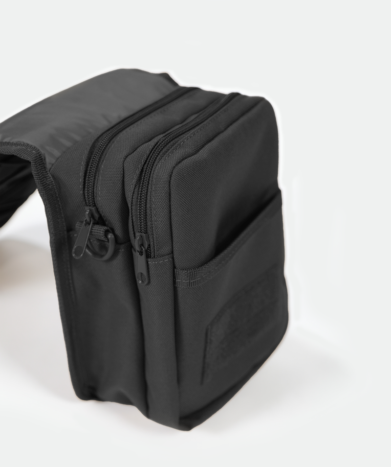 close up view for side for small, black crossbody shoulder bag with an adjustable strap with ,plus pocket black 