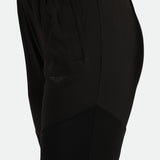 close  up view for fit woman wearing  pants black with logo 