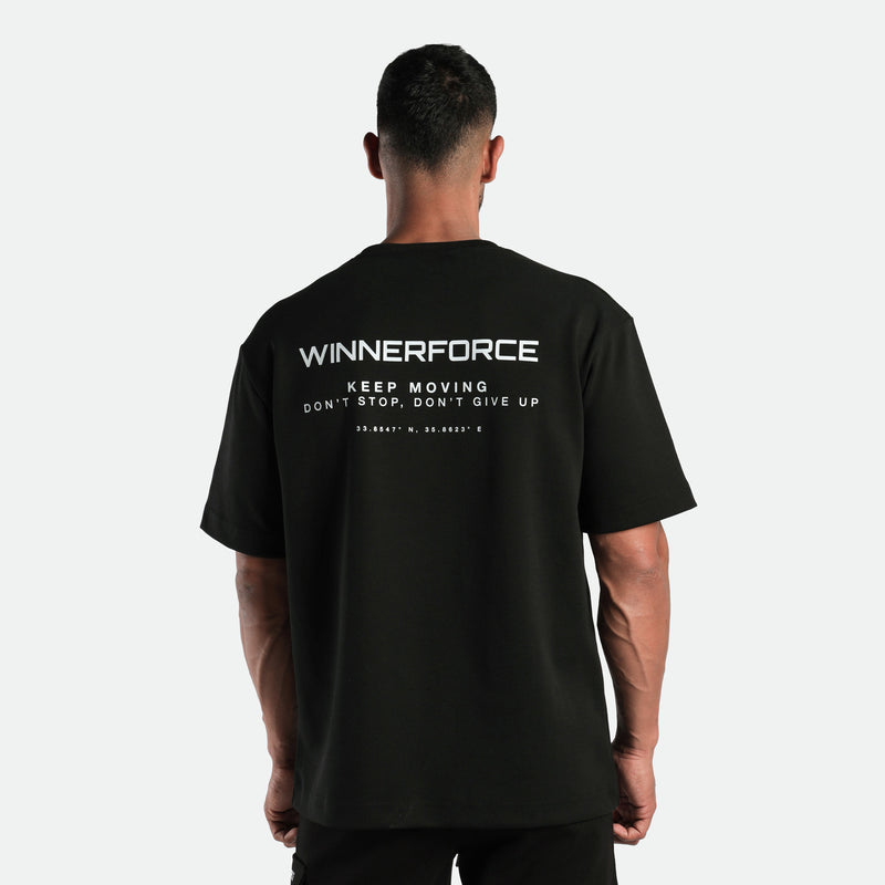 a back view for fit man wearing matching set black t-shirt with logo and short 
