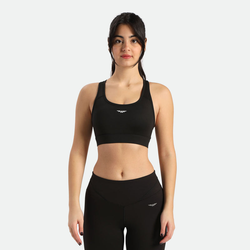 a women wearing bras and leggings black ,have same logo  ,but the direction  is different.