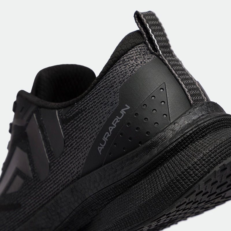 Close-up of a black athletic shoe with a sleek, textured design. The word "Aurarun" is visible on the side, conveying a modern, sporty style.