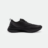 Sleek black athletic shoes with a textured mesh upper, flat black laces, and a subtle perforated pattern on the side. Displayed on a plain white background.