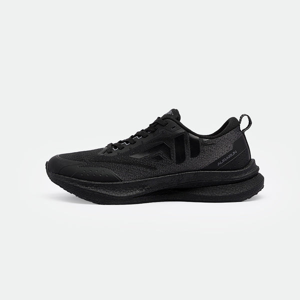 Sleek black running shoes with textured mesh and rubber sole. Features subtle logo and lace-up design, conveying a modern, sporty aesthetic.