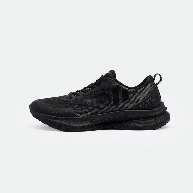 Sleek black running shoes with textured mesh and rubber sole. Features subtle logo and lace-up design, conveying a modern, sporty aesthetic.